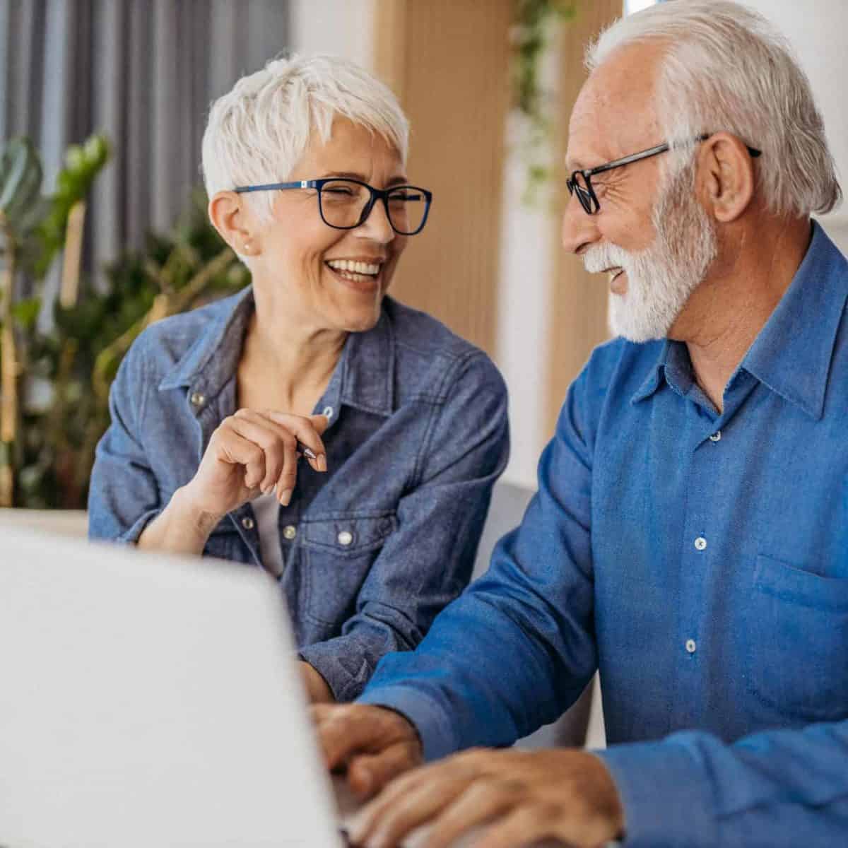 California Precious Metals IRA & Investing Company Copy of Senior couple at laptop smiling GettyImages 1323096524 1200x1200 1