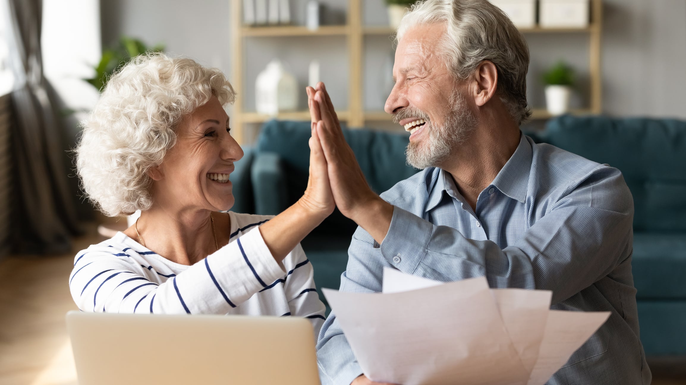 CAPISTRANO BEACH Silver IRA & Investing Company a happy senior couple
